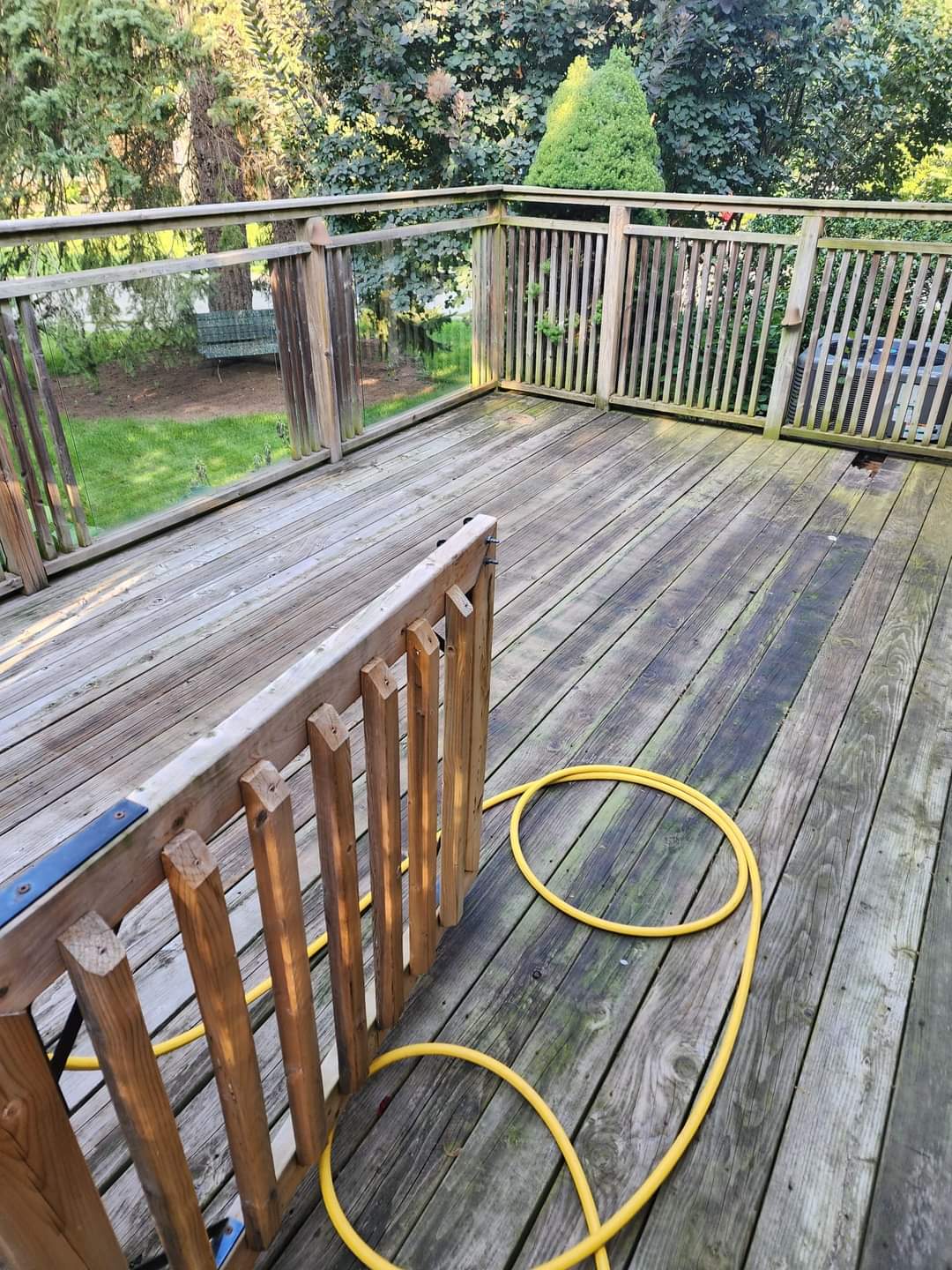 Grey weathered deck in Burlington before cleaning