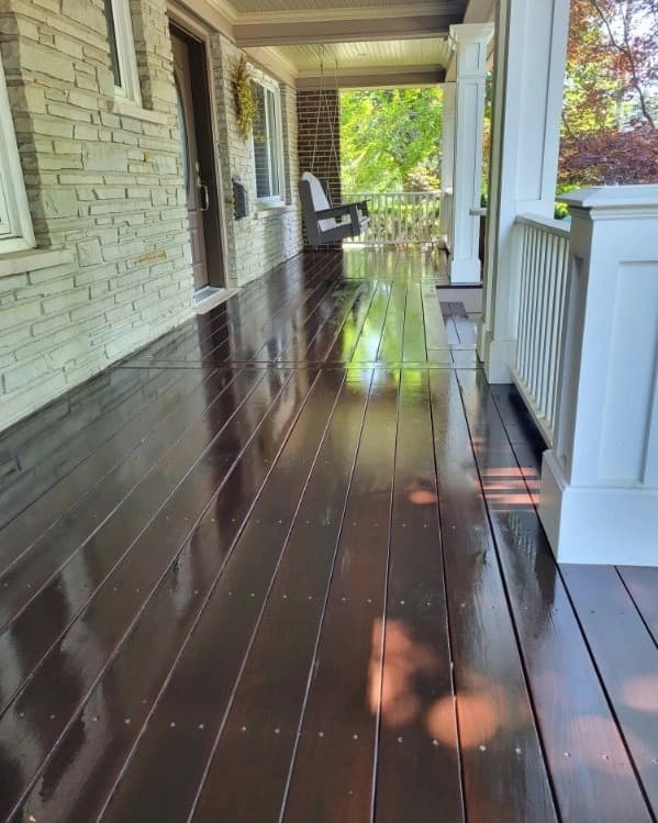 Brazilian Ipe porch finished with Cutek Extreme in a walnut tint