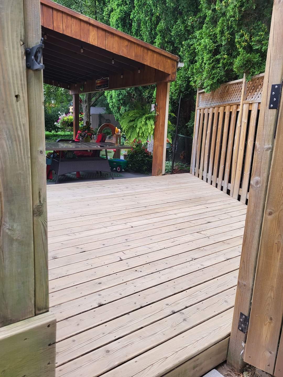 Gate opening onto a clean restored deck